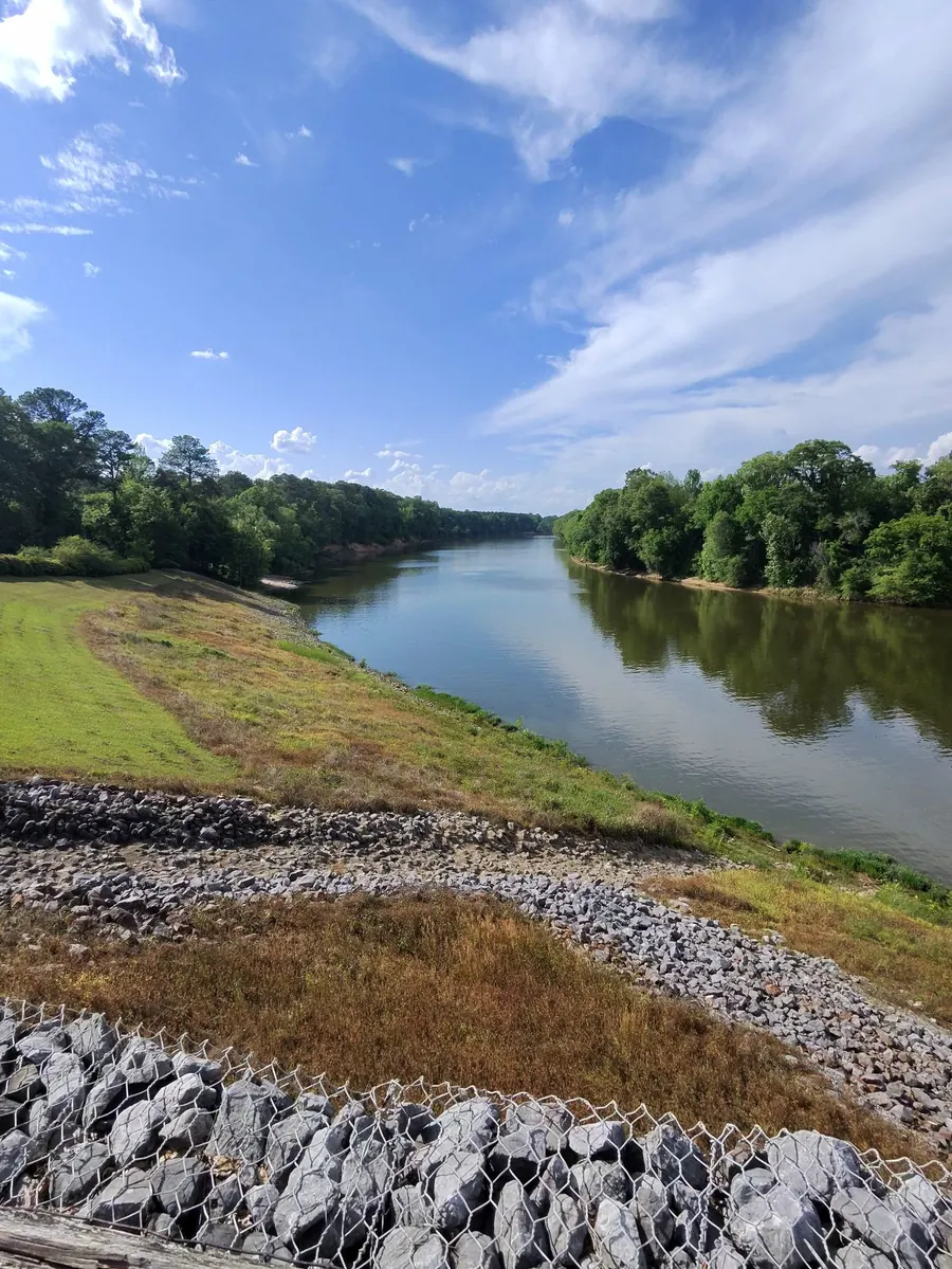Wide Alabama river under blue sky