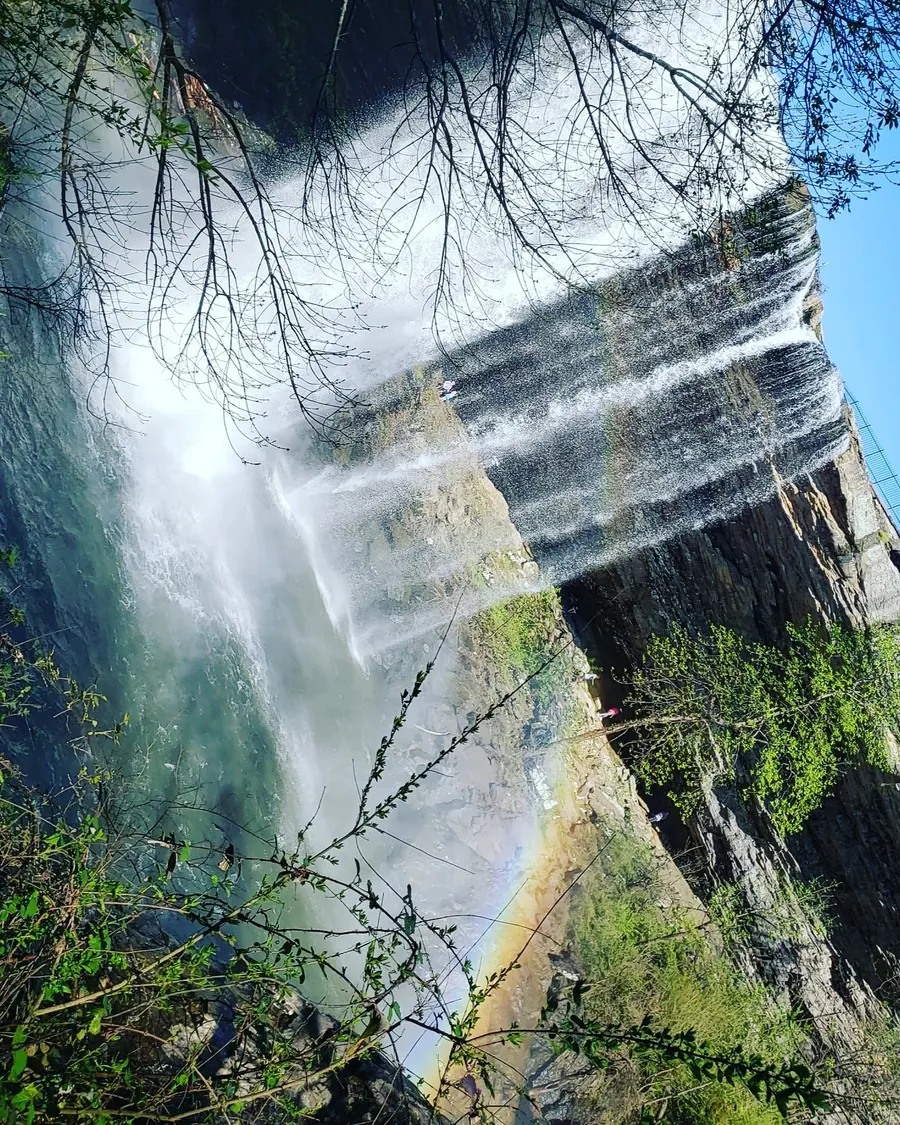 Alabama waterfall with mist and rainbow